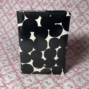 KATE SPADE
Cedar Street Blot Dot Passport Holder